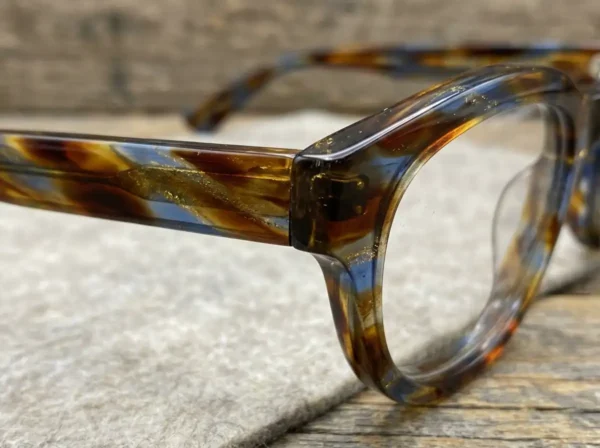 Italian acetate luxury eyeglass frames showing premium material quality and patterns