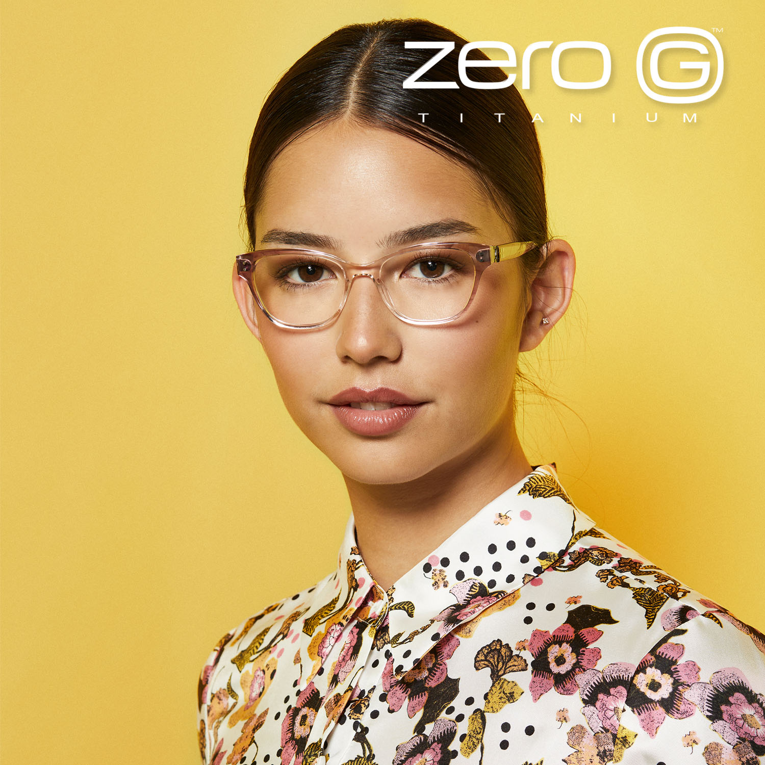 Woman wearing lightweight Zero G titanium frames, close portrait